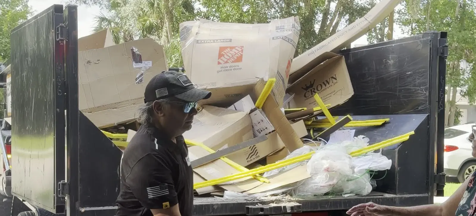 Eco Haul crew loading furniture into the truck